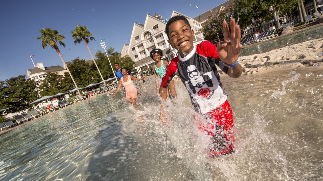 splashing through the water melts stress away for kids and adults at Stormalong Bay, the best pool at Walt Disney World