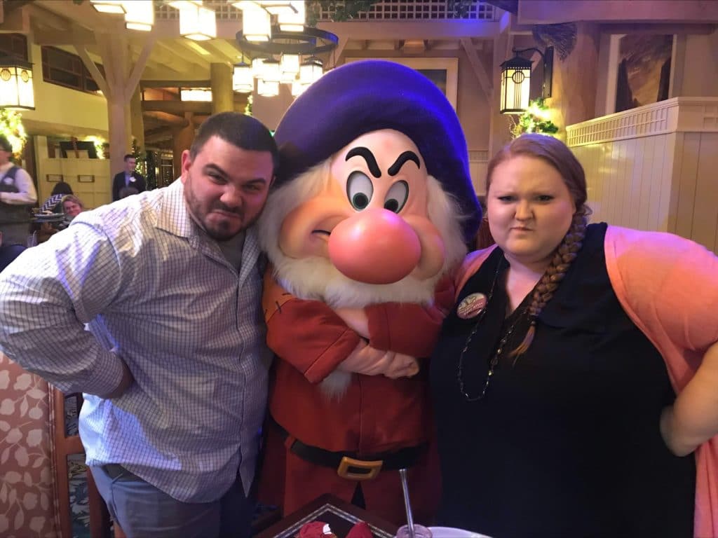 Ear To There Travel Agent Morgan Enjoying Time With Grumpy at Storybook Dining at Artist Point