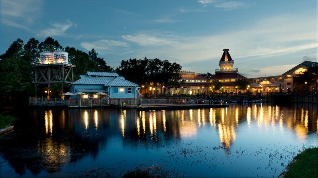 With the southern beauty and amenities of lakeside living (big sky overhead, trees and a shining reflection of the bayou-styled buildings into this Florida marina) you can see why Port Orleans is one of the best Disney World resorts for adults.